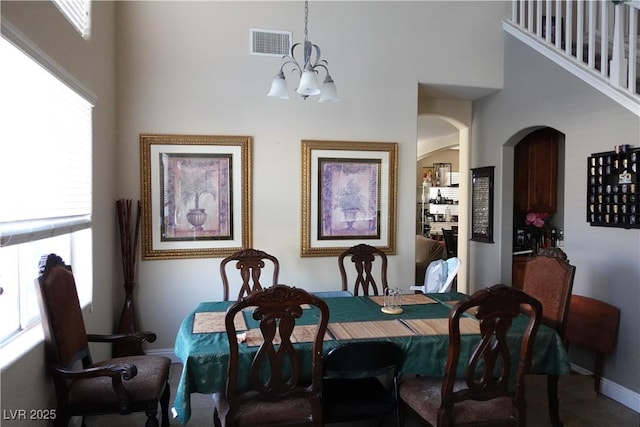 dining room featuring a notable chandelier