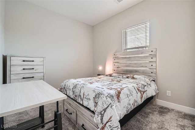 bedroom featuring dark carpet