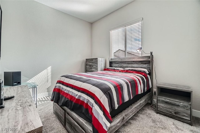 bedroom featuring light colored carpet