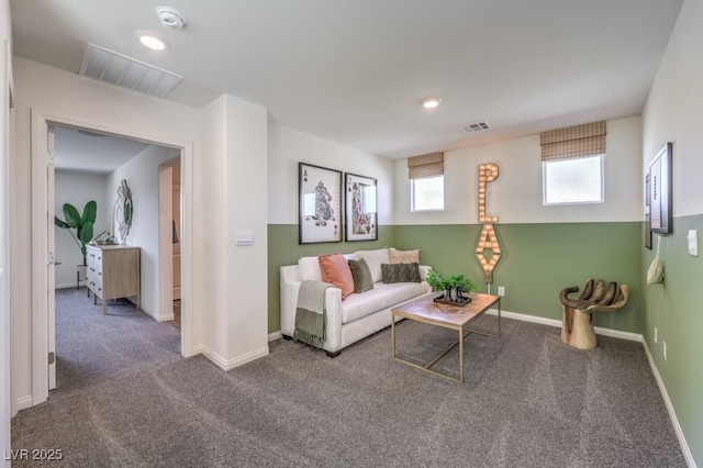 living room featuring dark carpet