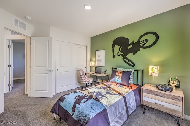 carpeted bedroom featuring a closet