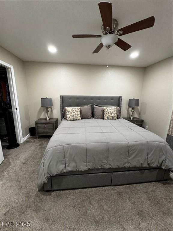 carpeted bedroom featuring ceiling fan