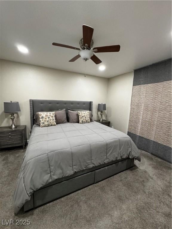 bedroom featuring ceiling fan and carpet flooring