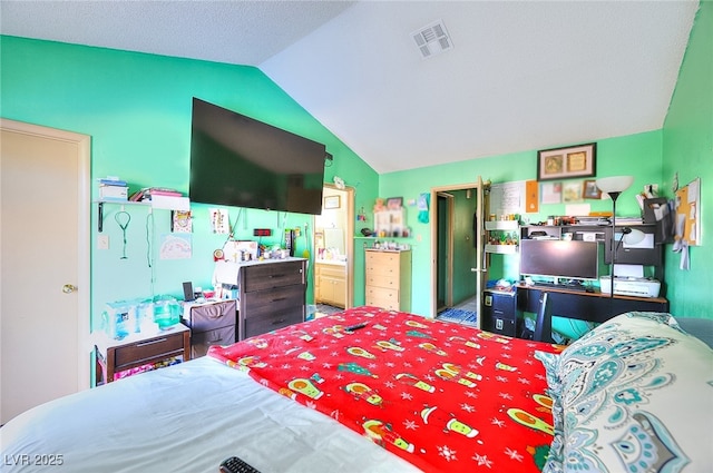 bedroom featuring vaulted ceiling