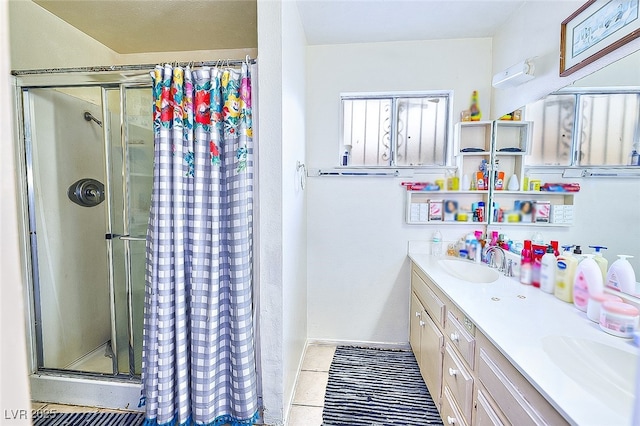 bathroom with vanity, tile patterned flooring, and a shower with curtain