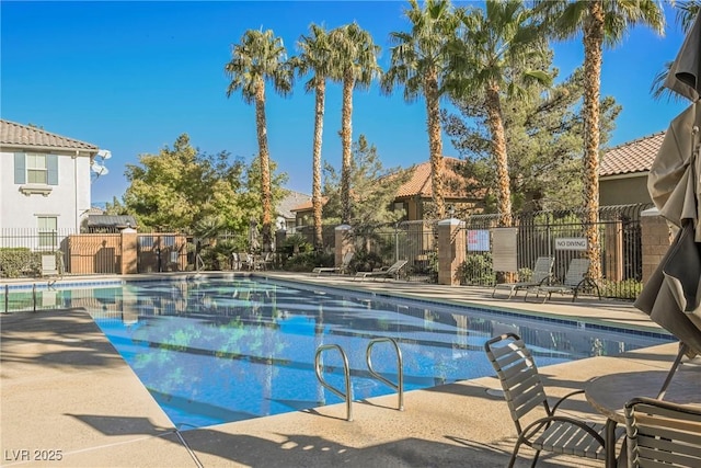 view of swimming pool featuring a patio