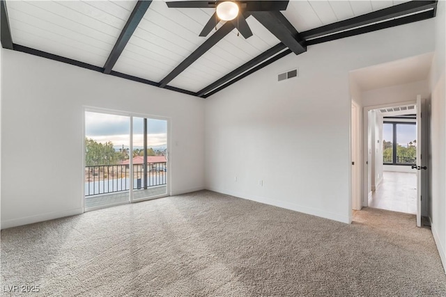 spare room featuring lofted ceiling with beams, light colored carpet, and ceiling fan