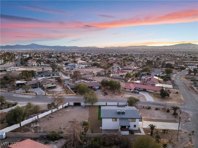 aerial view at dusk with a mountain view