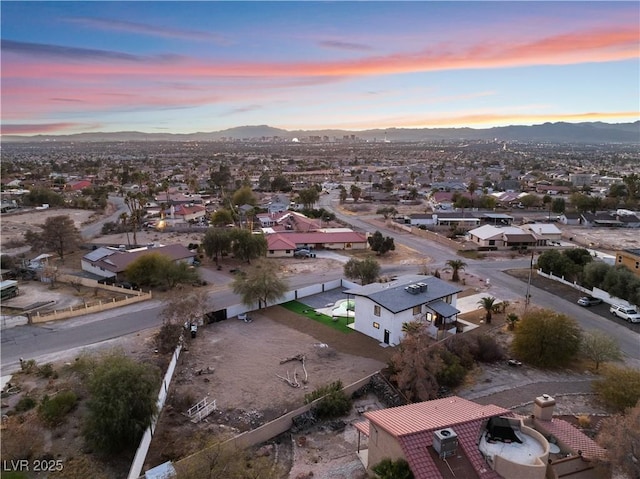 aerial view at dusk with a mountain view