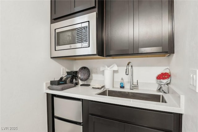 kitchen featuring stainless steel appliances and sink