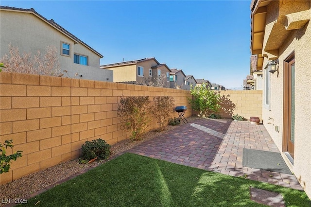 view of yard with a patio area