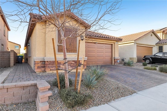 view of front of property featuring a garage