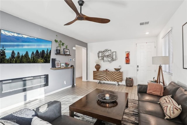 living room featuring ceiling fan