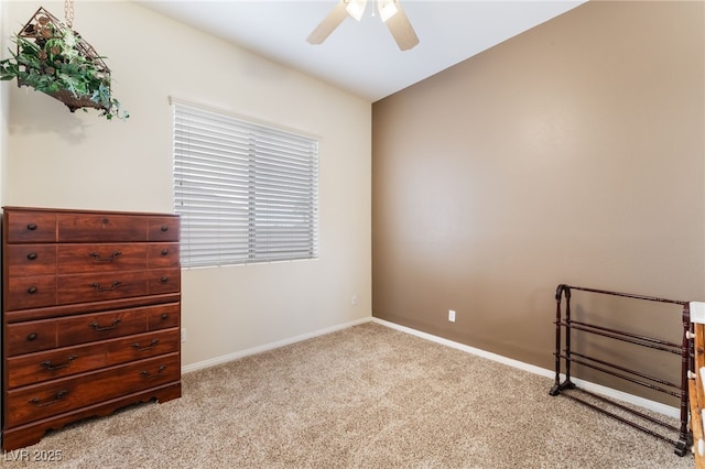 bedroom with carpet, baseboards, and a ceiling fan