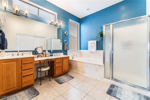 bathroom with tile patterned flooring, double vanity, a shower stall, and a bath