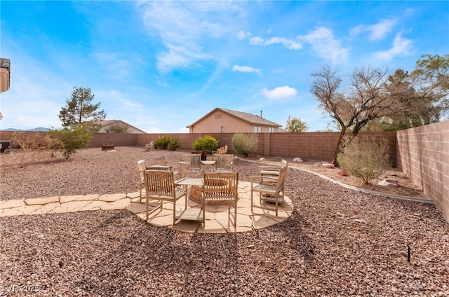 view of yard featuring a fenced backyard and a patio