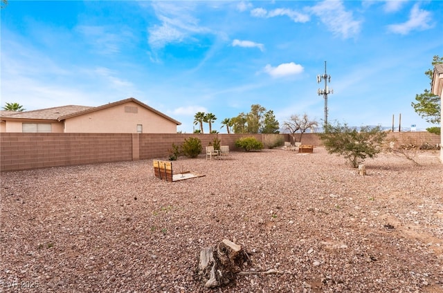 view of yard featuring a fenced backyard