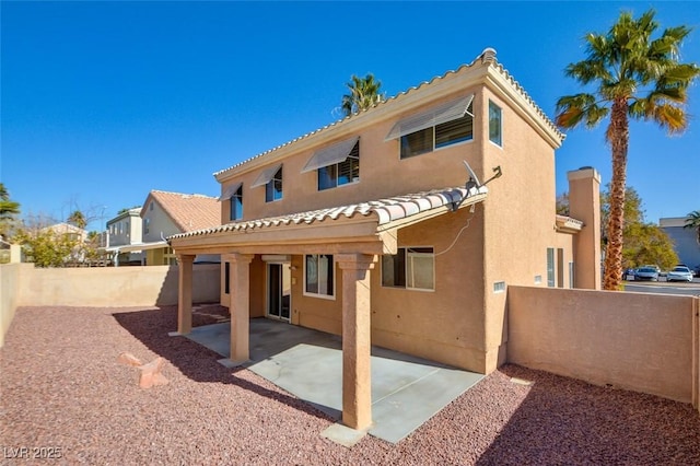 back of house featuring a patio area