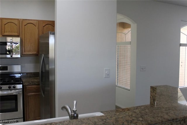 kitchen with sink and appliances with stainless steel finishes