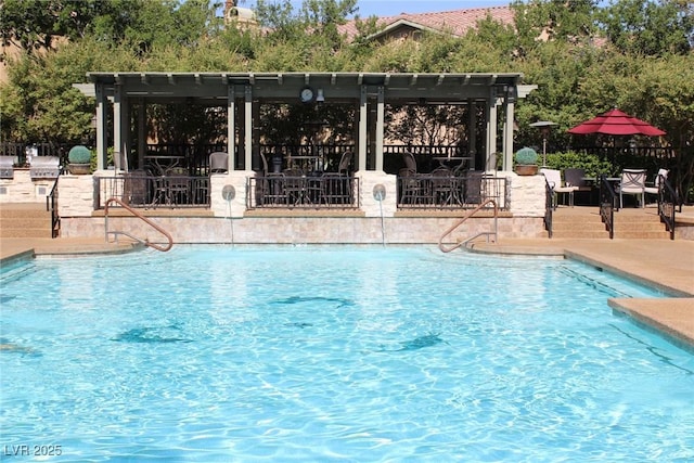 view of swimming pool featuring a patio