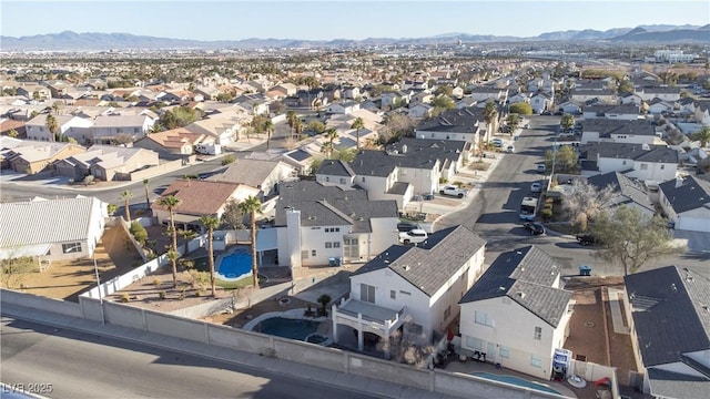 drone / aerial view with a mountain view and a residential view