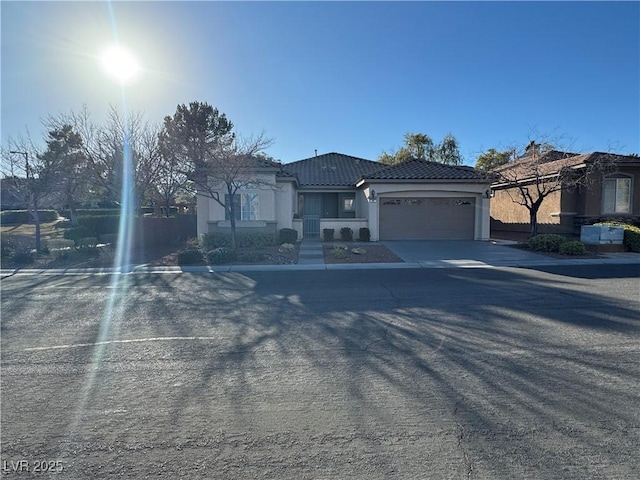 view of front of property with a garage