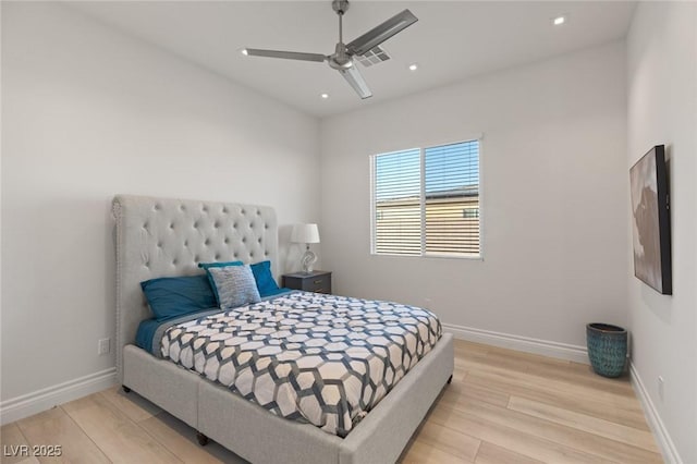 bedroom featuring ceiling fan and light wood-type flooring