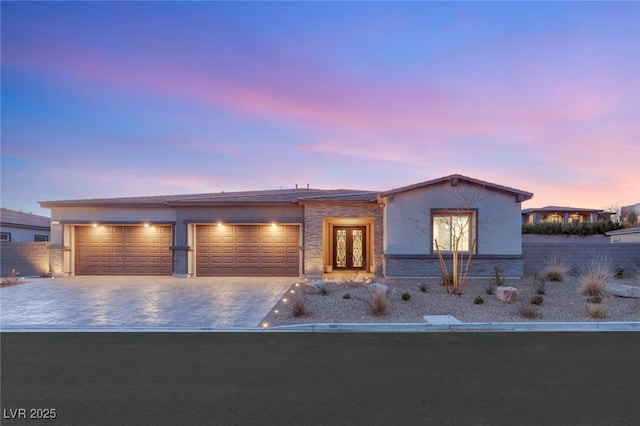 view of front of house with a garage