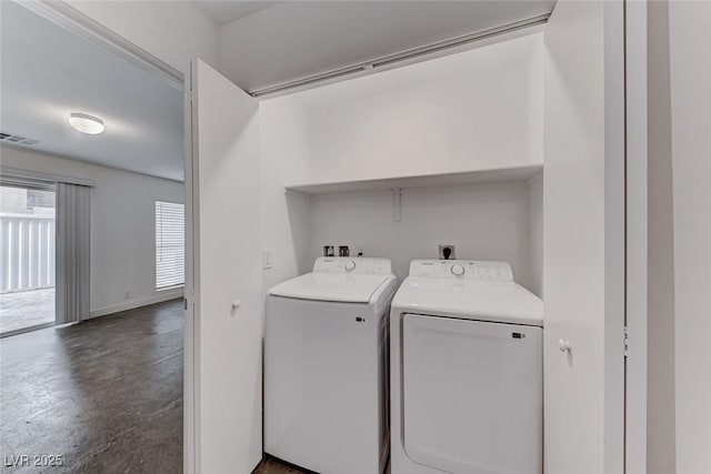 laundry area featuring independent washer and dryer