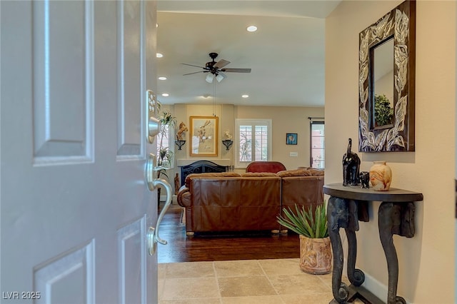 living room featuring ceiling fan