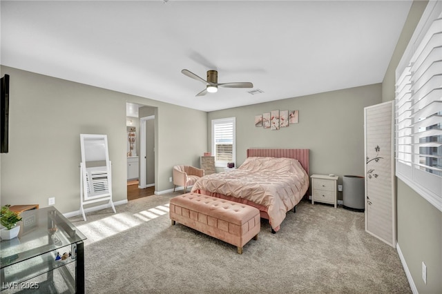 bedroom with light carpet and ceiling fan