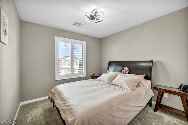 bedroom with light carpet