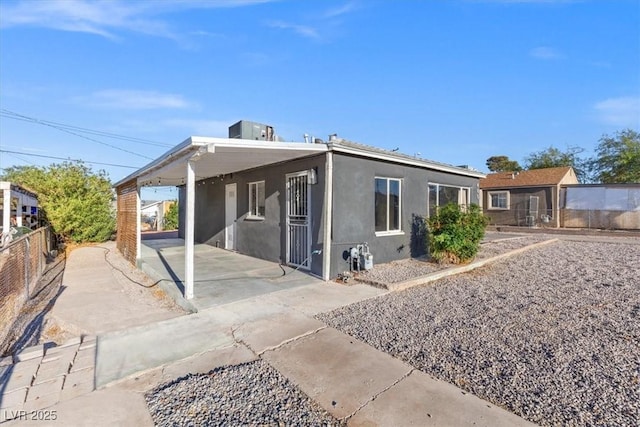 exterior space featuring a carport