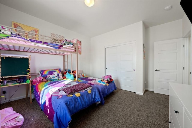 carpeted bedroom featuring a closet