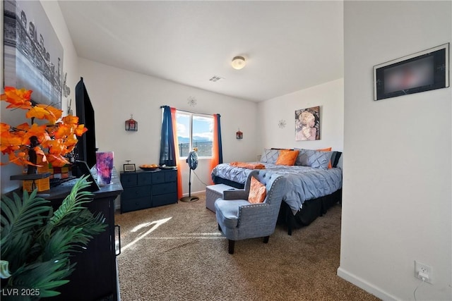 bedroom featuring carpet