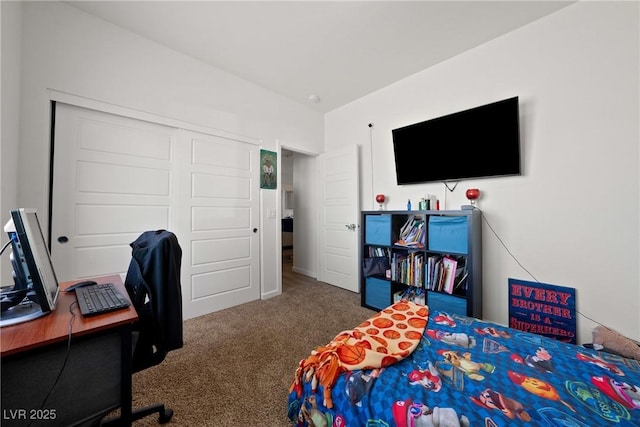 carpeted bedroom with a closet