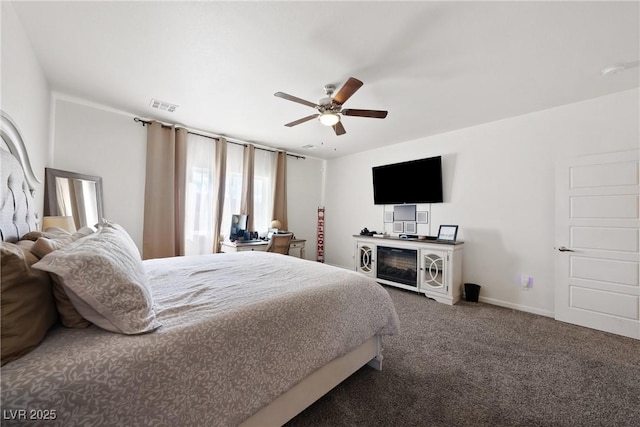 bedroom with ceiling fan and carpet