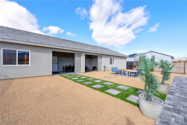 rear view of house with a patio area