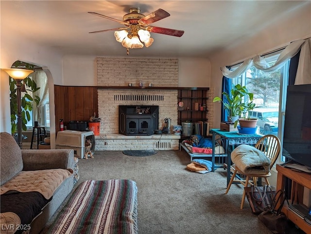 living room with ceiling fan and carpet floors