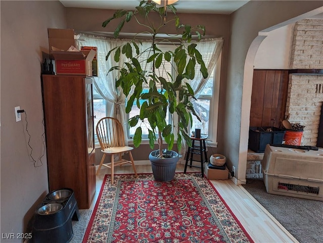 living area featuring hardwood / wood-style floors