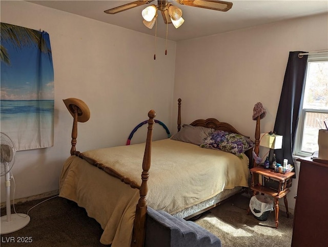 bedroom with ceiling fan and carpet