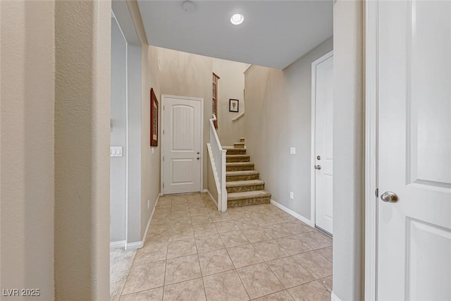 entrance foyer with light tile patterned flooring