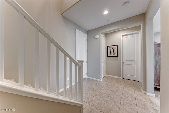 entryway featuring light tile patterned flooring