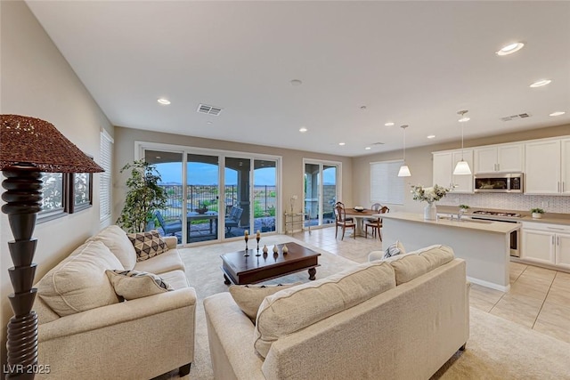 living room with light tile patterned floors