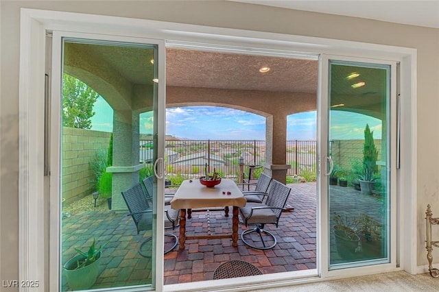 doorway to outside with a wealth of natural light