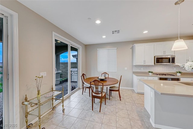 view of tiled dining space