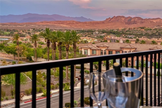 balcony at dusk with a mountain view