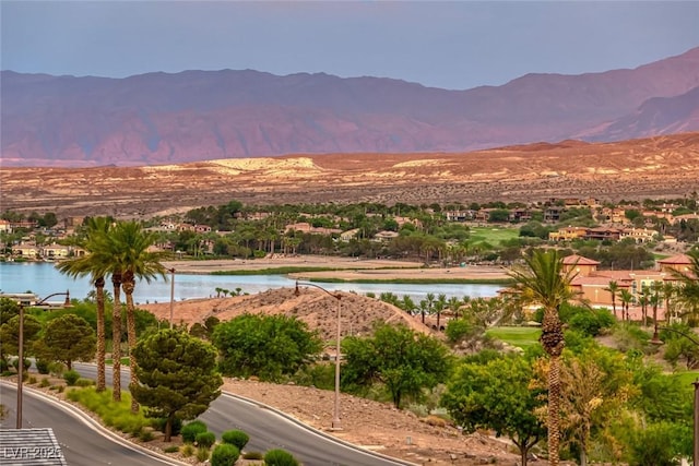 view of mountain feature with a water view