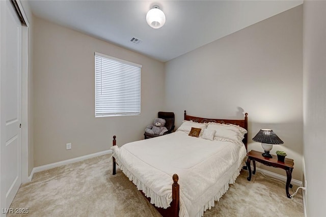 carpeted bedroom with a closet