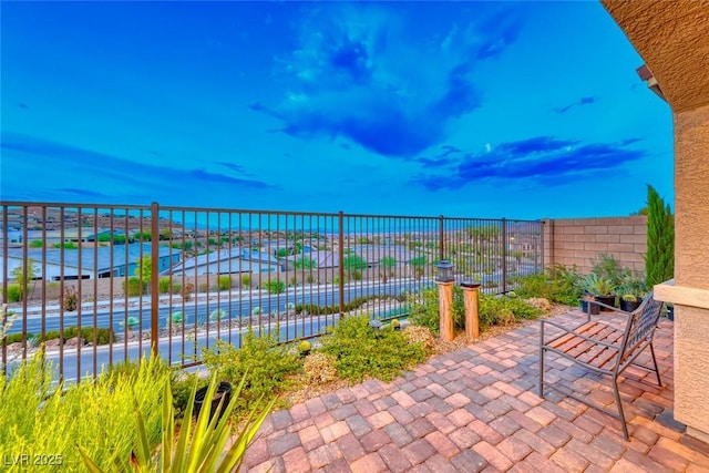 view of patio / terrace featuring a water view